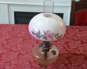 An Antique Clear Glass Table Oil Lamp with Hand Painted Milk Glass Shade