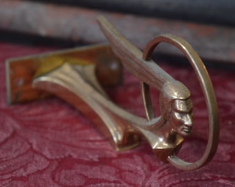 A Bronze Pontiac Indian in Circle Car Ornament