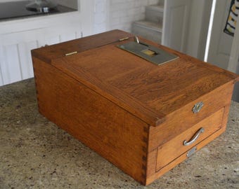 An Oak Timber Caed Antique National Cash Register