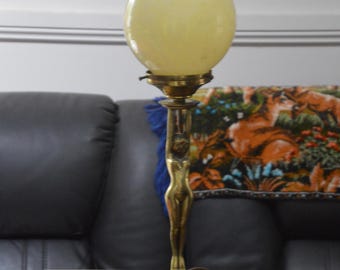 A Brass Art Deco Diana Lamp