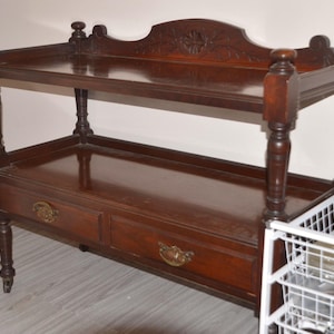 An Edwardian Era Oak Two Tier Two Drawer Dumb Waiter