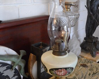 A Hand Painted Miller Oil Lamp