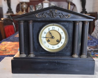 A French Black Marble Mantle Clock