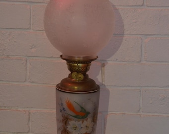 An English Glass Footed Oil Lamp