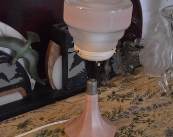 An Art Deco Pink Bakelite and Glass Table Lamp