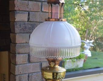 An Aladdin Model 12 4 Column Hanging Oil Lamp