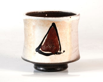 Soda fired yunomi with copper red shape decoration