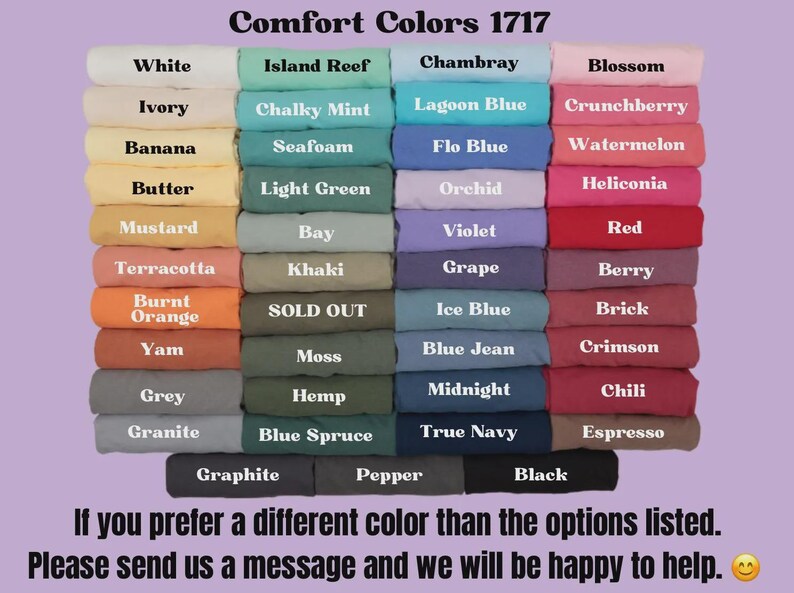May include: A color chart displays a variety of Comfort Colors 1717 fabric swatches. Colors include white, ivory, and black, with text indicating each shade. The image includes a message about custom color options.