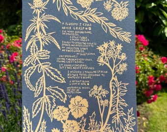 May include: A gold print on a dark blue background with a poem about fluidity and a river goddess. The poem reads: "A fluidity I could never grasp... I've never been one thing, an endless sea... a stale puddle... a murky river... I dared to cross the endless bridge and offer a gift to my ancestral spirit, my river goddess... and dissolve... my sleet demon, seeping through every crack, filling every vessel... It sounds confusing, but I was never confused... I was born a trickling stream destined to pool and shrink to whatever I desire... a defiant ocean, a spit of rain... whatever is needed, for joy or protection."