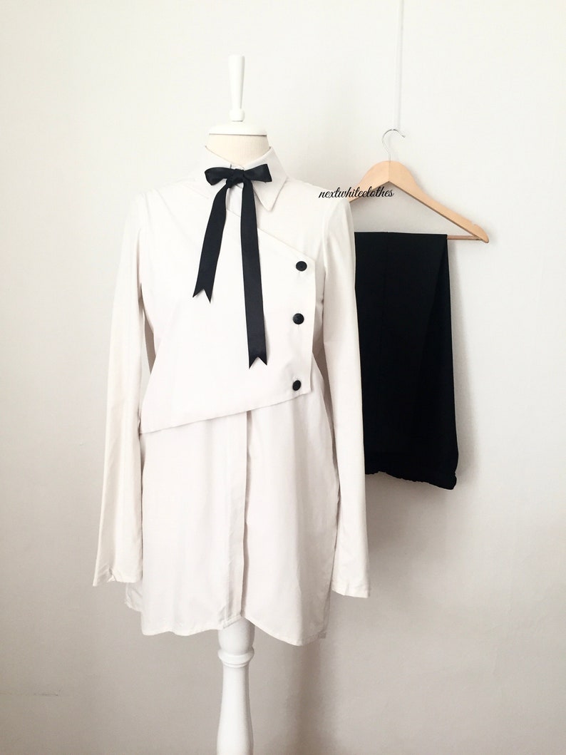 collared shirt minimal button up top long sleeves cream white button down tunic with collar neckline double layer blouse with buttons