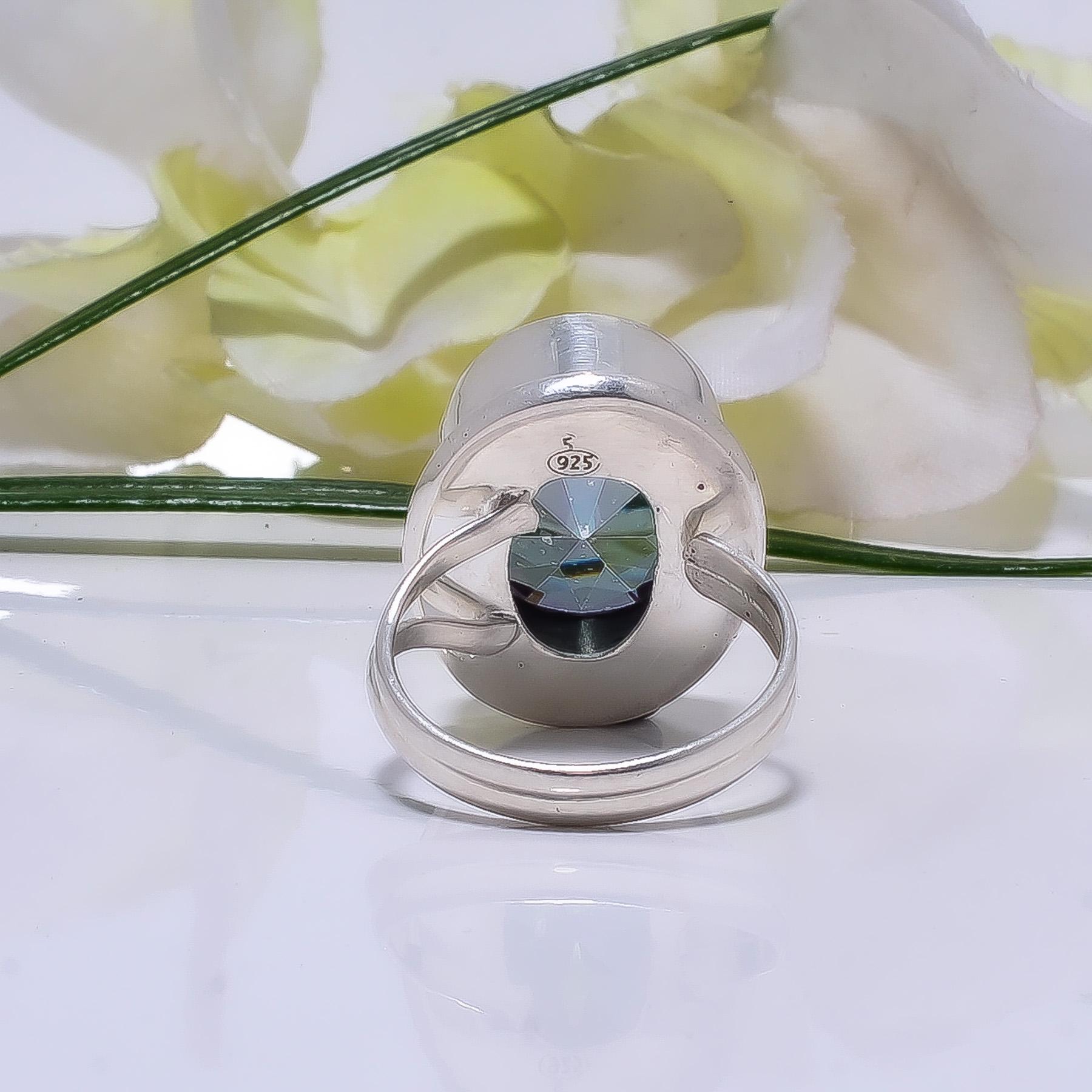 Anello a maglia oro giallo con topazio azzurro ovale di ct. 8 circa, g