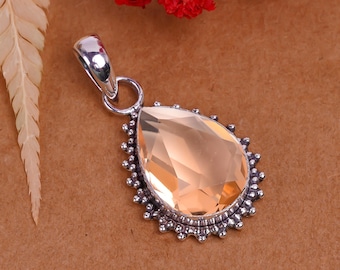 Colgante de morganita en forma de pera hecho a mano en plata de ley 925