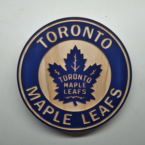 Toronto Maple Leafs hockey 11" round carved and hybrid painted/natural grain wood wall hanging sign