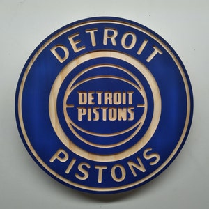 Detroit Pistons carved and hybrid painted/natural grain wood wall hanging sign (11&quot; round)