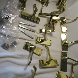 Brass Door Handles - a selection of 14 Brass Door handles