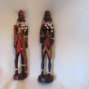 Lovely pair of African warrior figures - carved and decorated - hand made