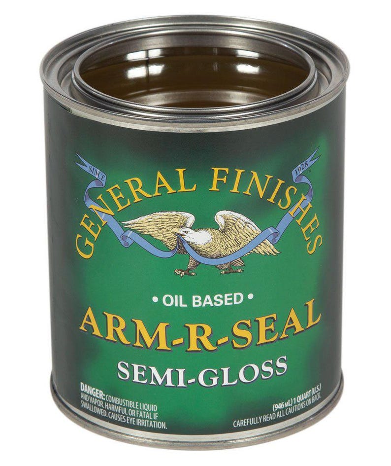 May include: A green can of General Finishes Arm-R-Seal Semi-Gloss oil-based wood finish. The can is labeled with the product name, brand, and size: 1 quart (946 ml).