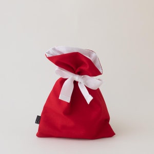 Borsa regalo rosso acceso e bianco