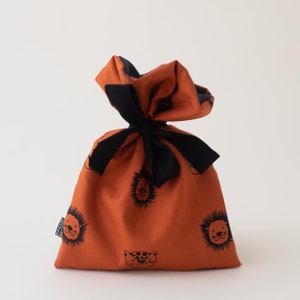 Borsa regalo leone e leopardo arancione ruggine