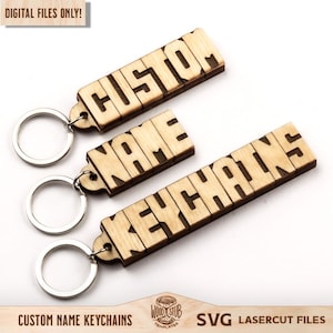 May include: Three wooden keychains with the words "CUSTOM", "NAME", and "KEYCHAINS" laser-cut into them. Each keychain has a silver metal ring. The words "DIGITAL FILES ONLY!" and "CUSTOM NAME KEYCHAINS" are also visible.