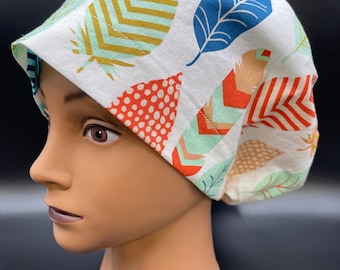 Women&#39;s Scrub Cap, Euro Style.  Feather’s on White w/ adjustable toggle lock