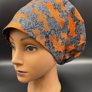 Women&#39;s Scrub Cap | Euro Style |  Mystery Orange Bats w/ adjustable toggle lock