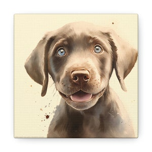 May include: A close-up portrait of a chocolate brown Labrador Retriever puppy with blue eyes. The puppy is looking up with its tongue sticking out, and the background is a light beige with brown watercolor splatters.