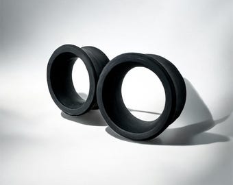 Black custom silicone flesh tunnels, alternative gothic gift idea.