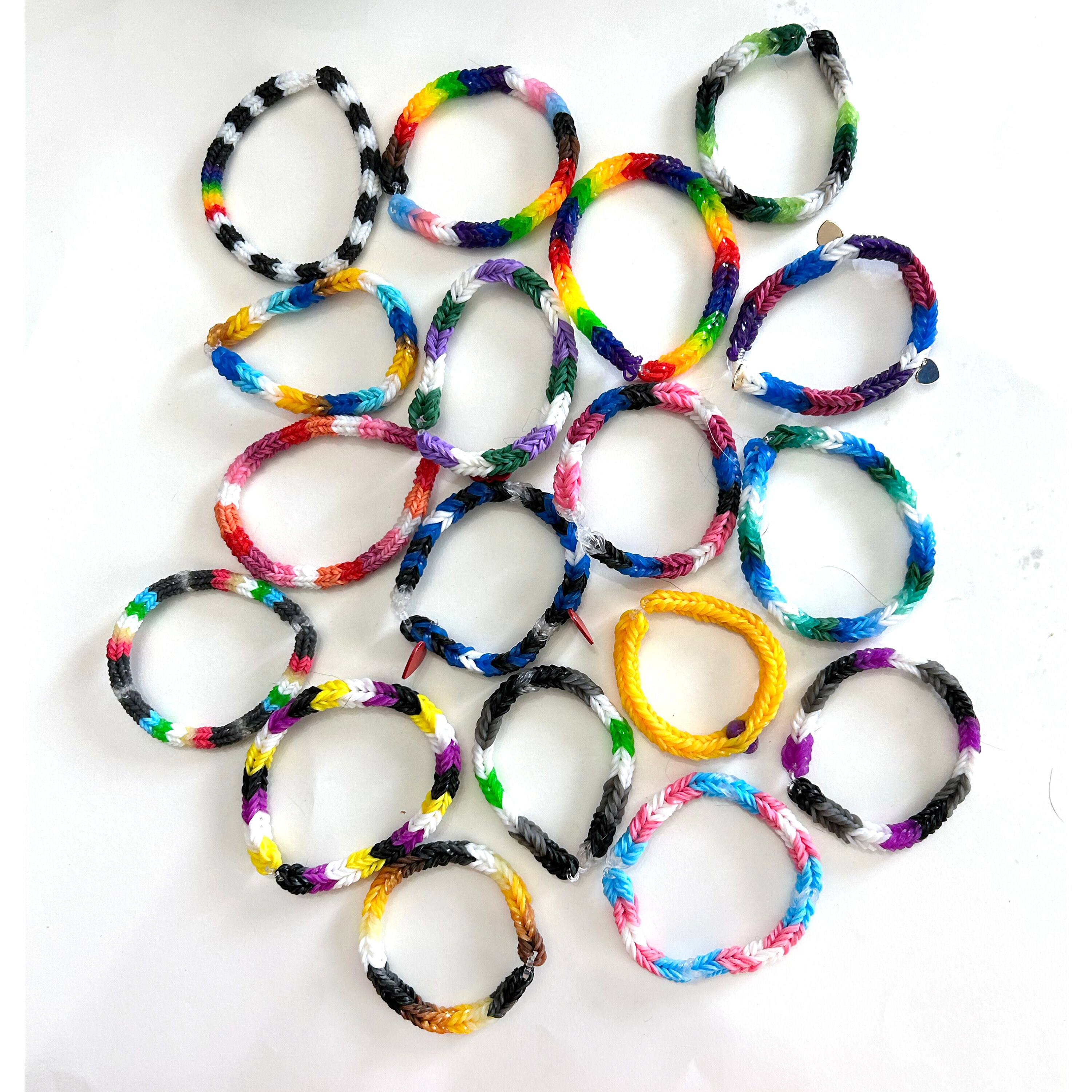 Colorful Rainbow loom bracelet rubber bands fashion on old wood