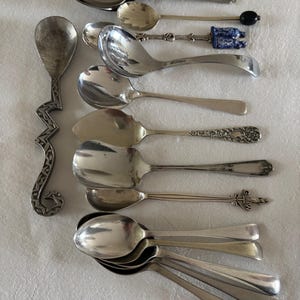 16 assorted vintage small metal spoons