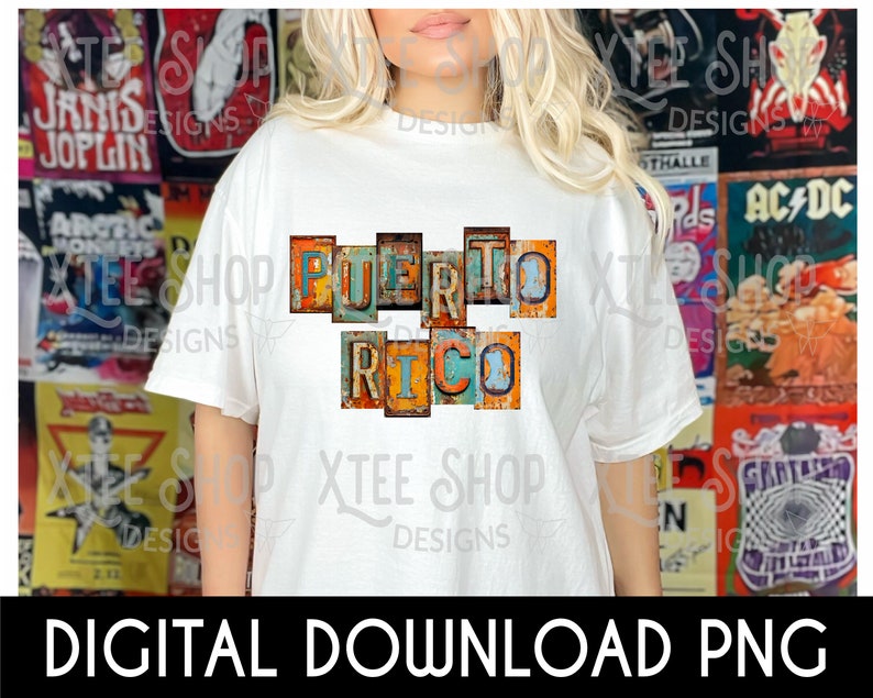 May include: White t-shirt with a graphic of the words "PUERTO RICO" in colorful, distressed, vintage-style letters.