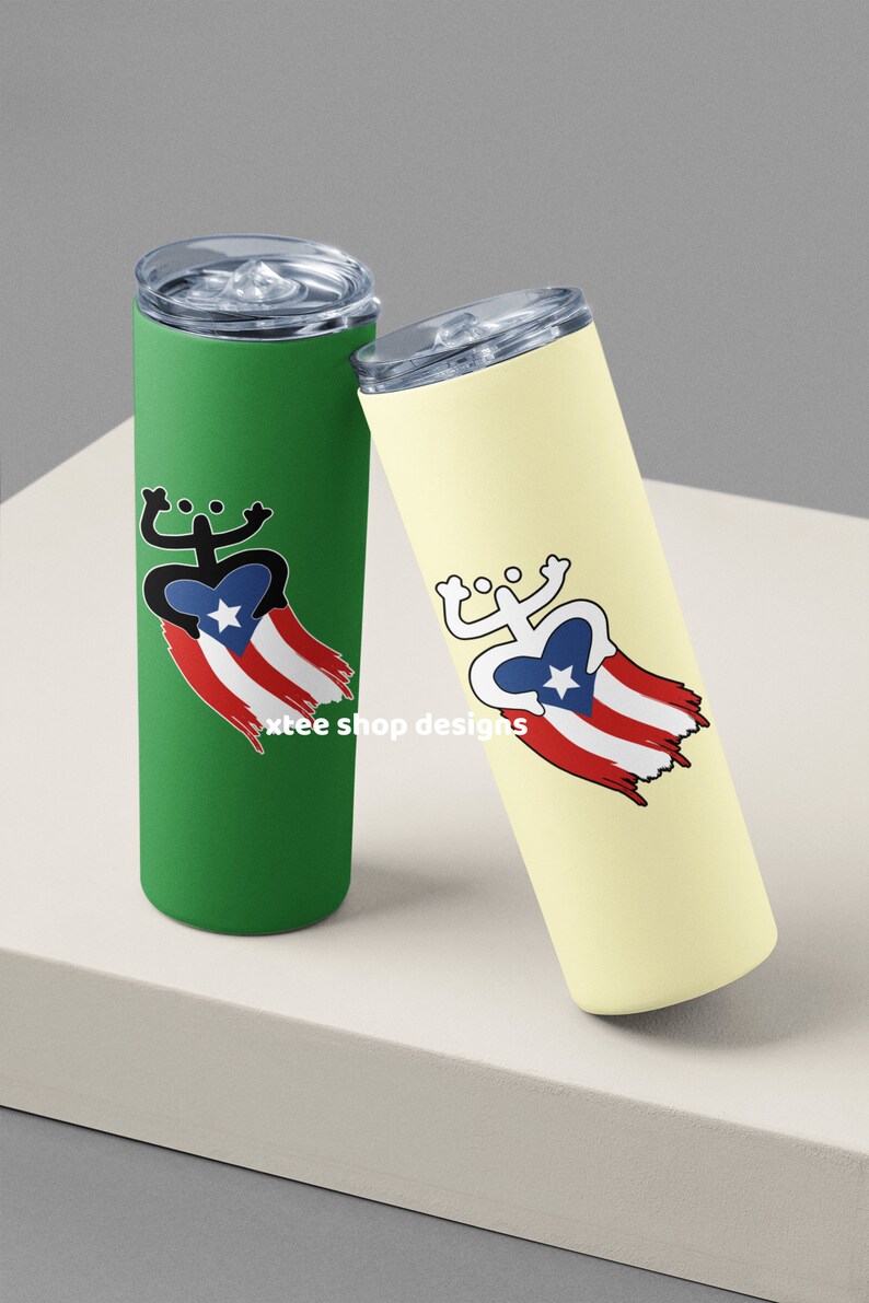 May include: Two stainless steel tumblers with lids. One is green with a black and white coqui frog on a Puerto Rican flag. The other is yellow with a white coqui frog on a Puerto Rican flag.