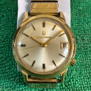 Vintage Bulova Accutron Date watch. Automatic Circa 1973. Solid 14 K case. * Not running *