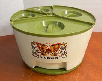 Mid Century 5 piece 1970s  Sterlite Kitchen Canisters w/ Lazy Susan. Avocado green lids and base. Groovy psychedelic butterflies!