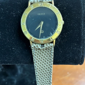 GUCCI 3000 M 腕時計 ウォッチ クォーツ ロゴ ローマン ゴールド色 VINTAGE GUCCI WATCH 3000M Gold Dial Brown Strap | eBay