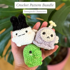 May include: Three crocheted Tamagotchi characters in white, green, and lavender. The white character has black ears, the lavender character has a yellow accessory, and the green character has a simple design. The text "Crochet Pattern Bundle" and "Tamagotchi Characters" is visible.