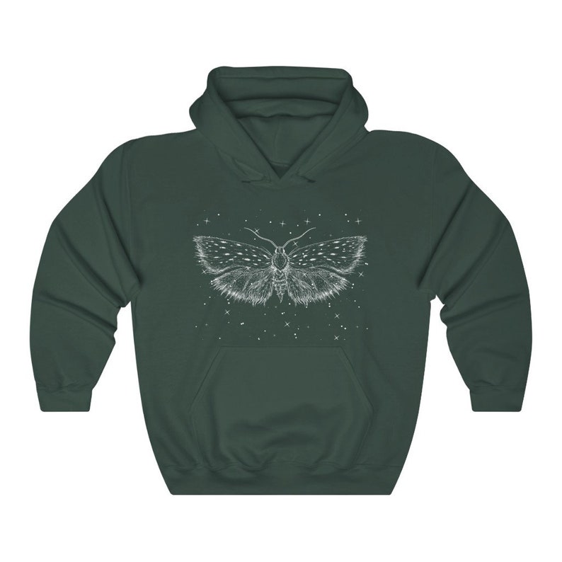 May include: A dark green hoodie with a white outline of a moth with wings spread wide. The moth is surrounded by small white dots, resembling stars.