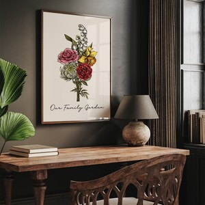 May include: A framed print featuring a botanical illustration of a bouquet of flowers in shades of red, yellow, and white. The text "Our Family Garden" is printed below the illustration.