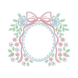 May include: An embroidered design featuring a central oval frame outlined in light blue with a dotted border. A pink ribbon and bow adorn the top, with light blue roses and small pink and white flowers and green leaves surrounding the frame.
