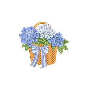 May include: A woven basket filled with blue and white hydrangeas and green leaves. A blue and white striped bow adorns the front of the basket. The basket has a handle and is set against a white background.