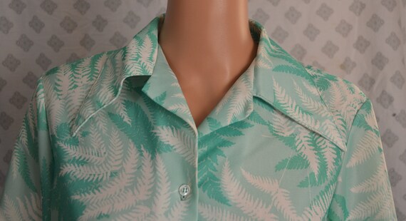 aqua green blouse