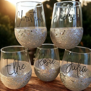 Personalized stemless wine glass with glitter-dipped bottom half, customized with any name for bridesmaids, birthdays, and special events.