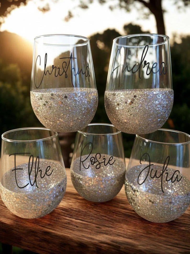 Personalized stemless wine glass with glitter-dipped bottom half, customized with any name for bridesmaids, birthdays, and special events.
