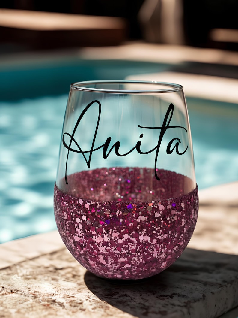 Personalized stemless wine glass with glitter-dipped bottom half, customized with any name for bridesmaids, birthdays, and special events.