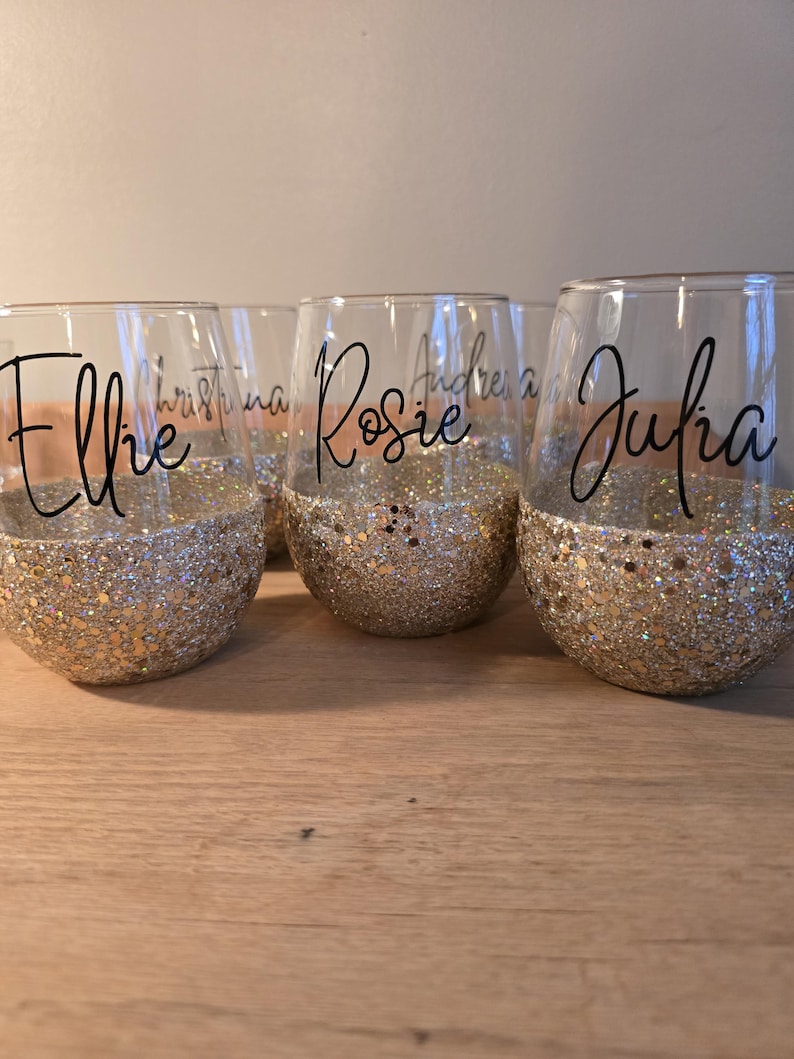 Personalized stemless wine glass with glitter-dipped bottom half, customized with any name for bridesmaids, birthdays, and special events.