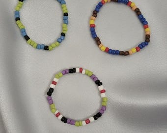 El conjunto de pulseras inspiradas en Toy Story incluye 3 pulseras de cuentas hechas a mano de diferentes estilos (Woody, Buzz y Alien).