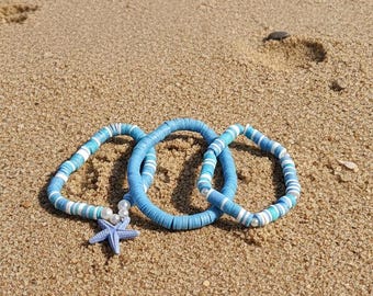 Conjunto de 3 pulseras elásticas hechas a mano con cuentas azules y perlas, estilo playero.