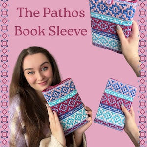 May include: A rectangular crochet book sleeve featuring a geometric pattern in shades of pink, light blue, and dark blue. The sleeve includes a single purple button closure at the top. The text "The Pathos Book Sleeve" is printed in dark pink.