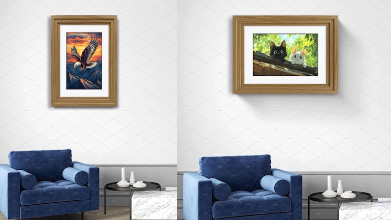May include: Two framed wall art prints displayed above a blue armchair. The left print shows a bald eagle flying over mountains at sunset. The right print depicts a black cat and a white cat peering over a roof edge amidst green foliage.