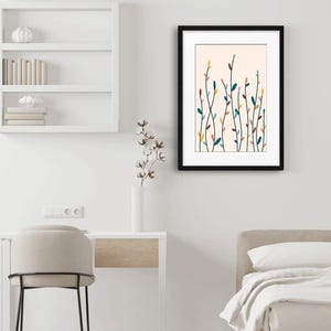 May include: A framed wall art print featuring a botanical illustration of slender, vertical stems with small, colorful leaves in shades of teal, yellow, and muted pink against a pale cream background, enclosed in a simple black rectangular frame.